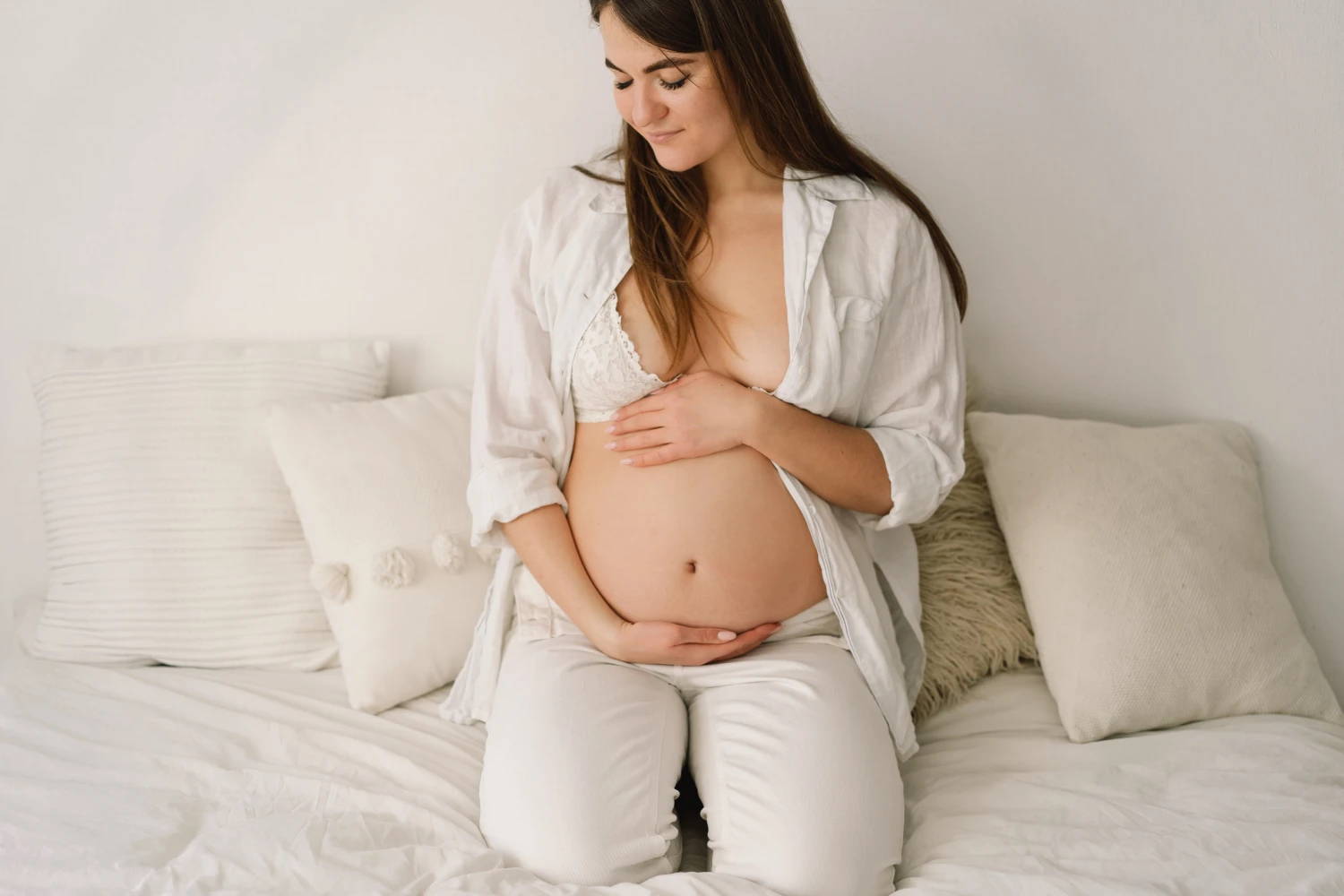 a-beautiful-pregnant-woman-dressed-in-white-cloth-2021-12-09-07-25-22-utc