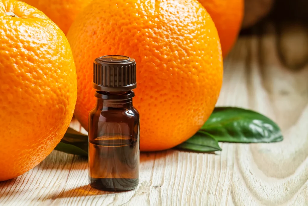 orange-oil-in-a-small-bottle-and-fresh-fruit-sele-2022-08-08-07-29-31-utc